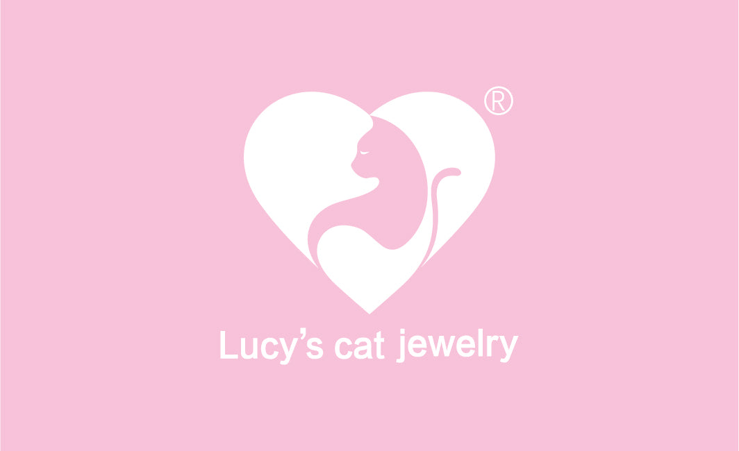 Lucy’s cat jewelry white heart and cat logo on pink